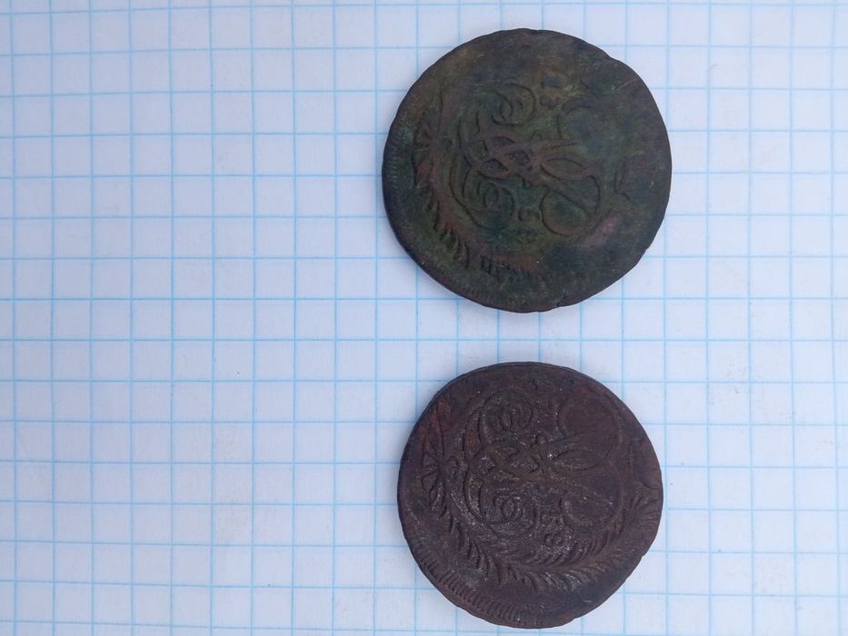 Монети         .