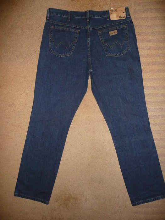 NOWE spodnie dżinsy WRANGLER W38/L34=50/116cm jeansy