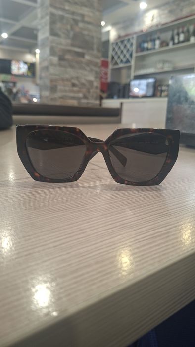 Óculos de sol prada milano