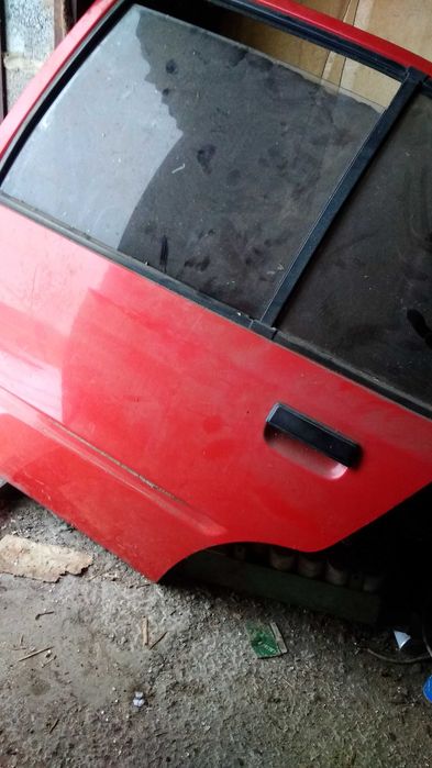 Двері задні ліві ПЕЖО 205, 309.