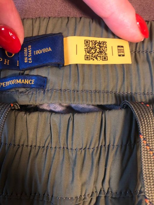 Спортивные Поло ,зеленого цвета ,состояние новых.оригинал .