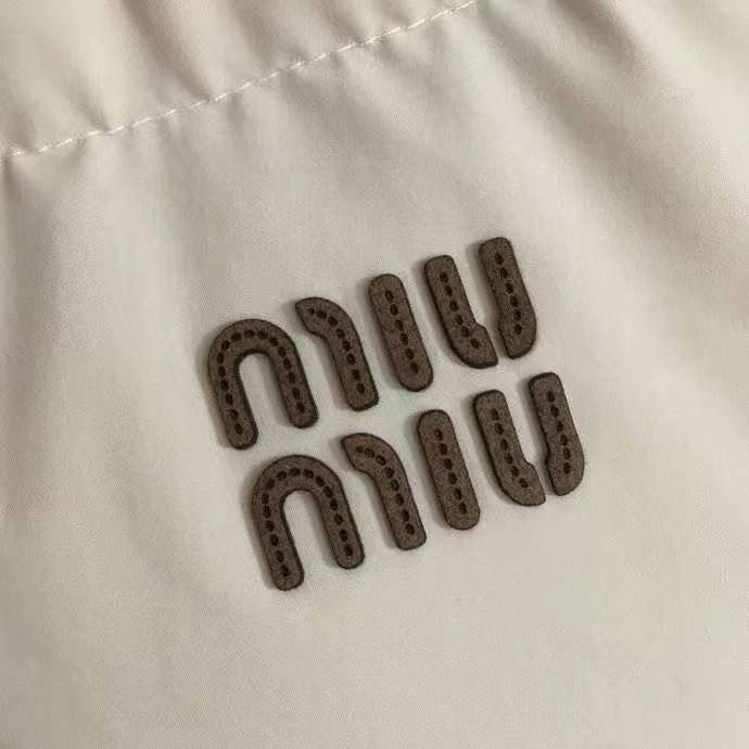 Куртка жіноча тепла miu miu зимова бежева — zdjęcie 4