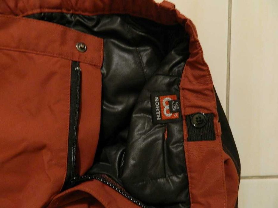 spodnie chłopięce 66 North narty snowboard materiał cordura 164cm nowe