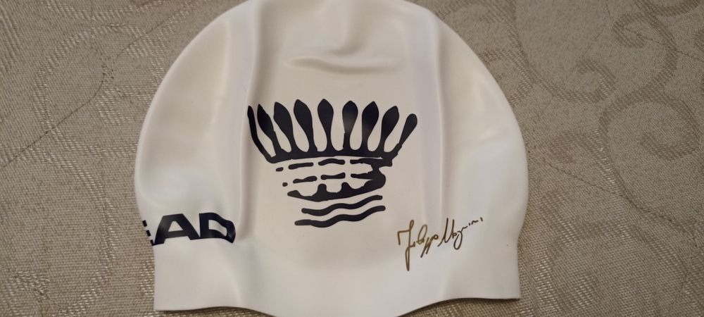 Шапочки для плавання