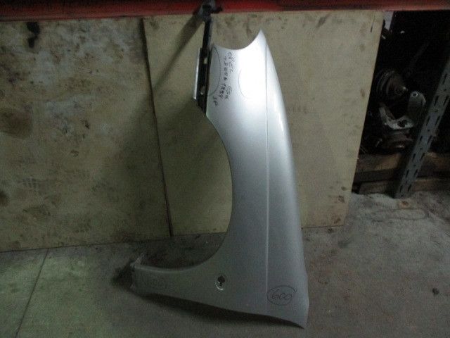 Guarda-lamas esquerdo OPEL Tigra (75_)
