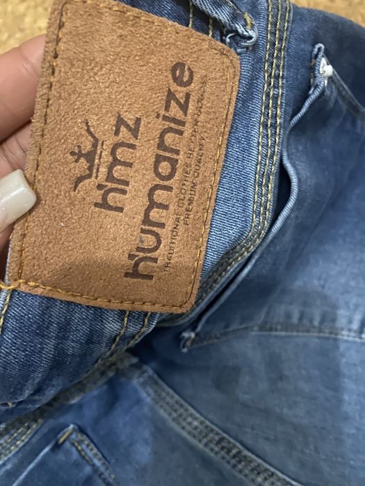 Calças skiny de ganga