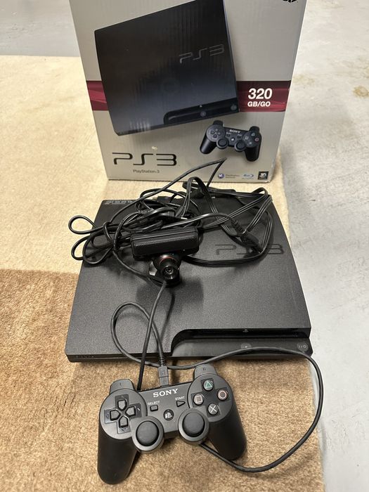 Consola PS3 320gb + 4 jogos + singstar microphone receiver