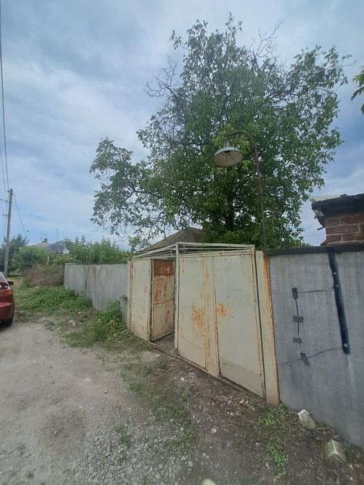 Ділянка з будинком  на раківці