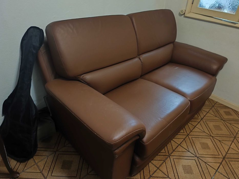 sofá cama em pele