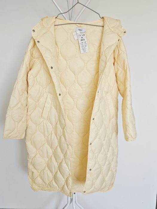 Jasnożółty pikowany płaszcz Reserved