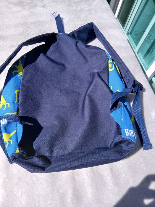 Mochila escolar azul com dinossauros kids