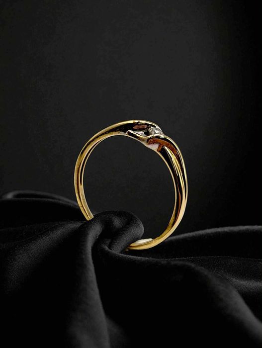 Złoty pierścionek z brylantem 585 /1,26