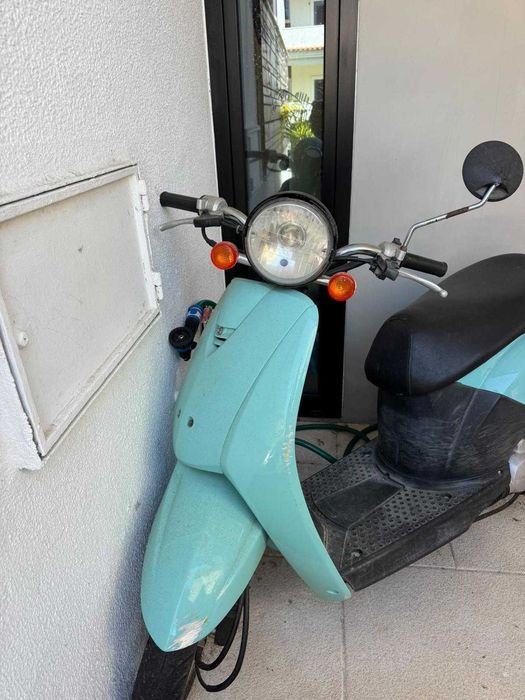 Mota Honda em excelente estado