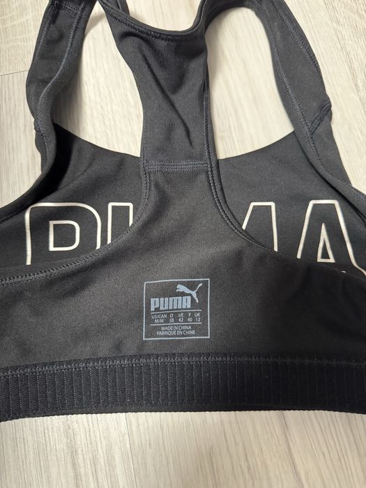 Топ puma чорного кольру виідеальному стані М