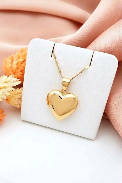 Złota zawieszka sekretnik w kształcie serca