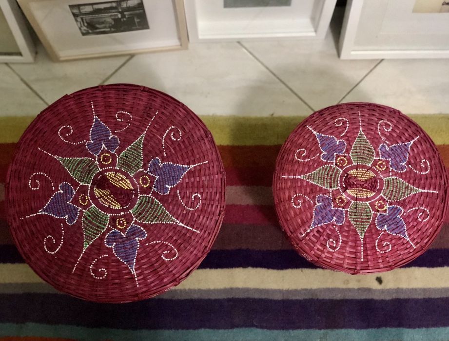 Two hand-painted Peruvian wicker baskets.64286434374787121