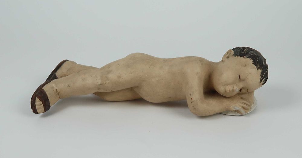 Meninos Jesus, deitado e na almofada, CADA