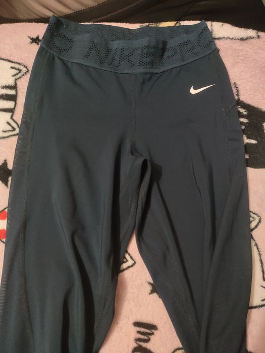 Leginsy Nike z siatką