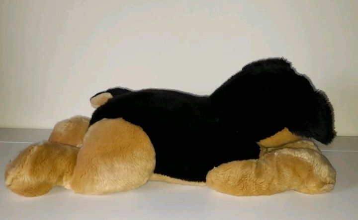 cão de peluche de criança