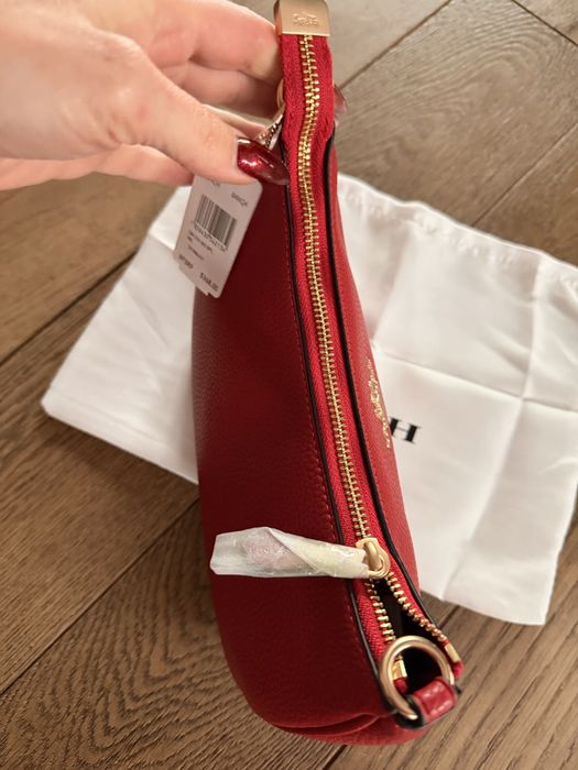 Elegancka torebka Coach – skórzana, z dwoma paskami