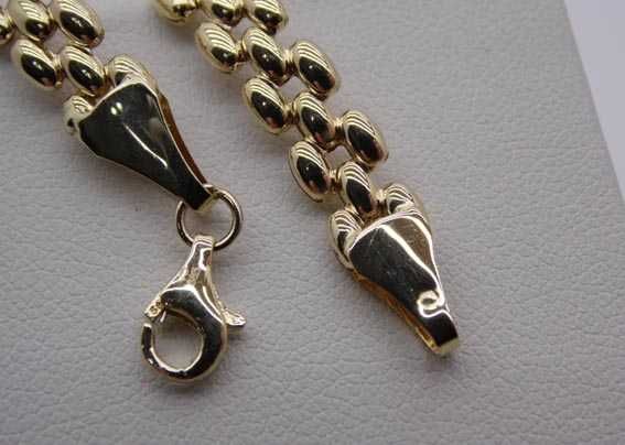 Złota bransoletka pękate ozdoby 19 cm. 6,4 mm.