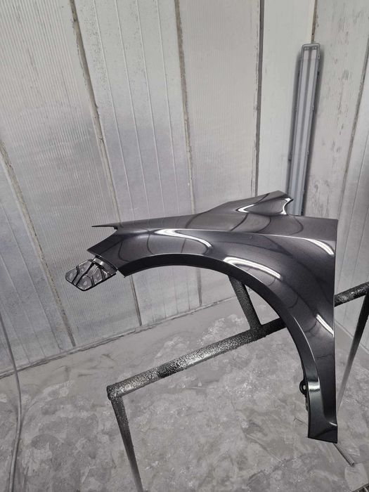 Błotnik Volkswagen Golf 5 V 09-13 PLUS kolor L041 LO41 NOWY LEWY