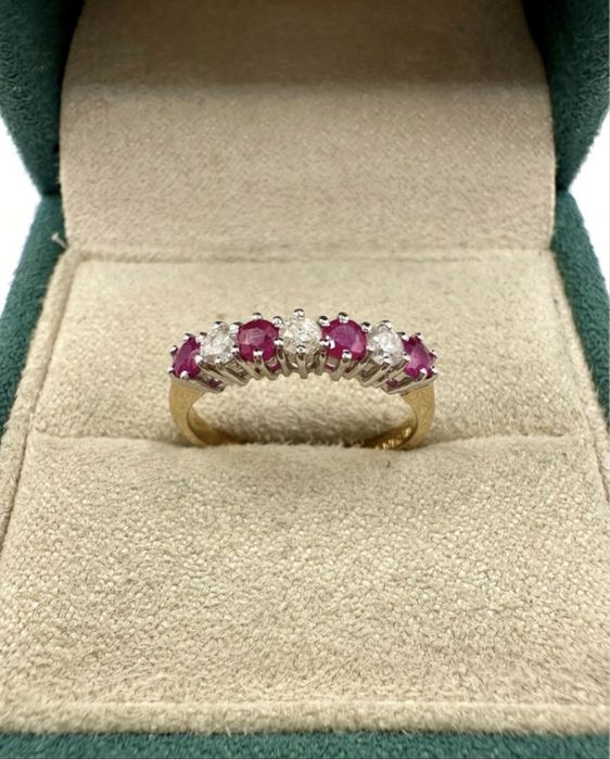 Złoty pierścionek 750 z rubinami 0,40ct i diamentami 0,21ct