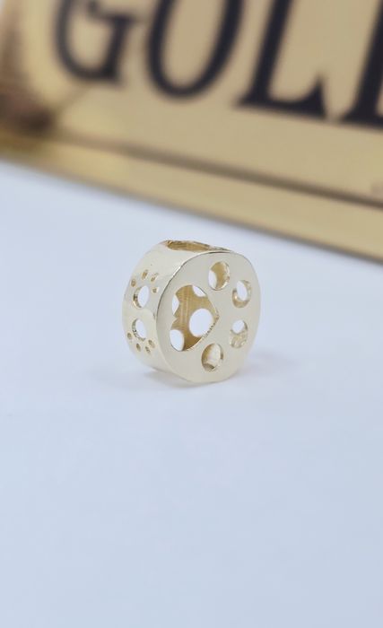 Złoty charms łapka próba