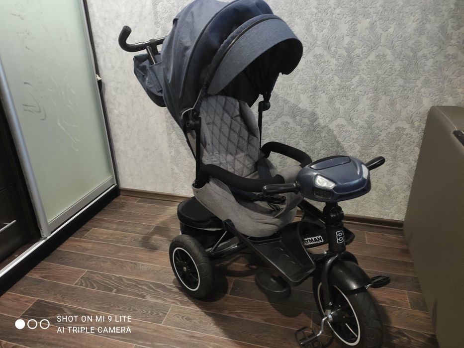 Продам дитячий велосипед-візок.