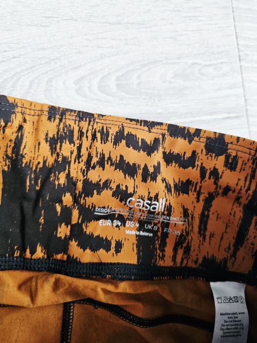 Wzorzyste legginsy sportowe premium Casall xs 34