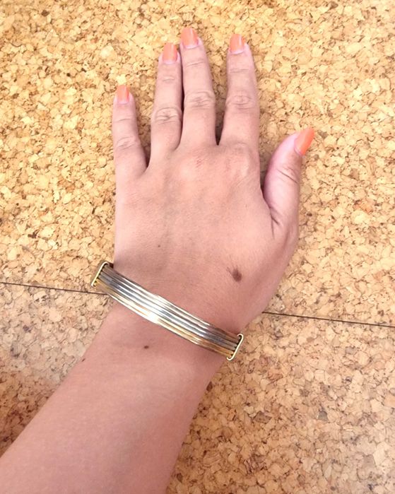 Pulseira metalizada prateada e dourada