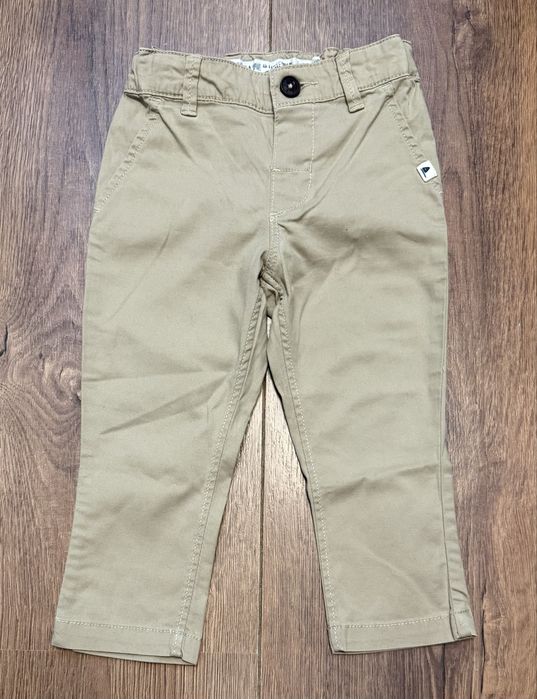 Beżowe eleganckie spodnie chłopięce H&M r. 80 chinosy wizytowe