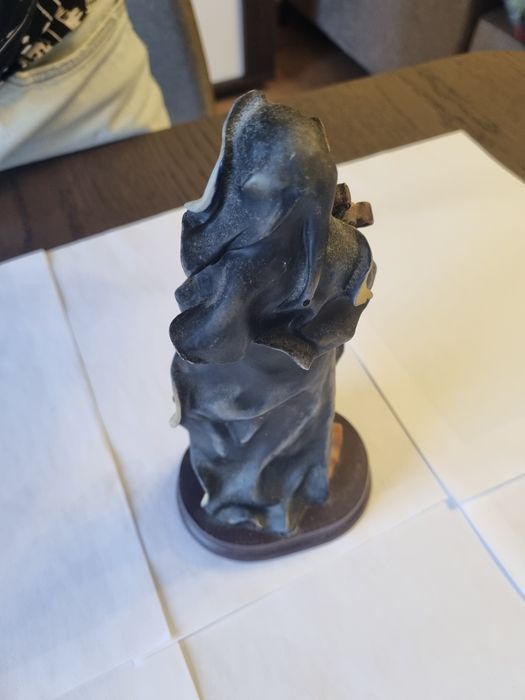 Estatueta de Sta. Teresa com a cruz