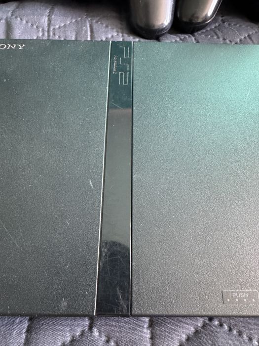 PlayStation 2 + 2 pady + gry – zestaw retro PS2