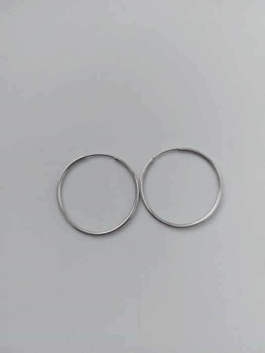 Віддам срібні сережки кільця.  ,.