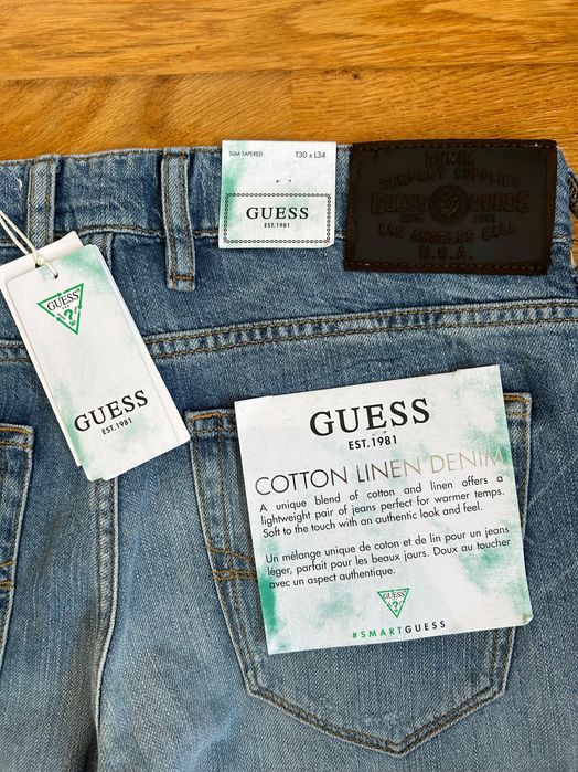 Calças GUESS novas com etiqueta e preço de origem