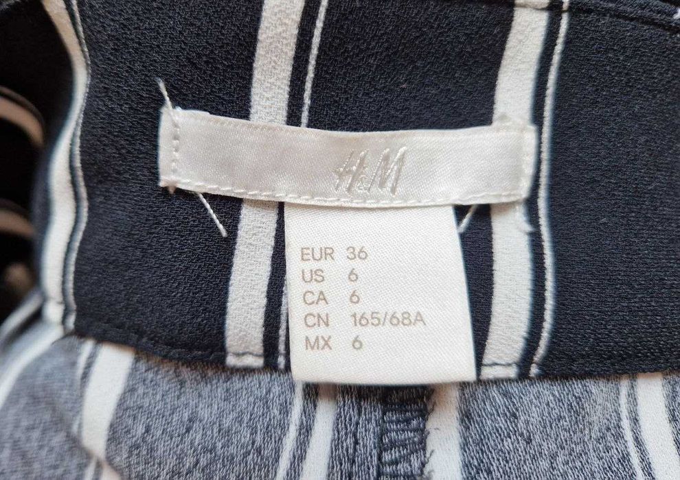 Стильні укорочені штани у смужку