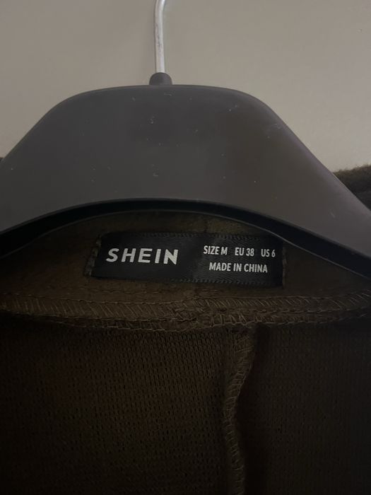 casaco comprido verde