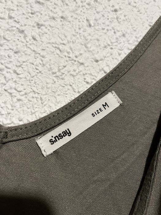 Długi wiązany kombinezon