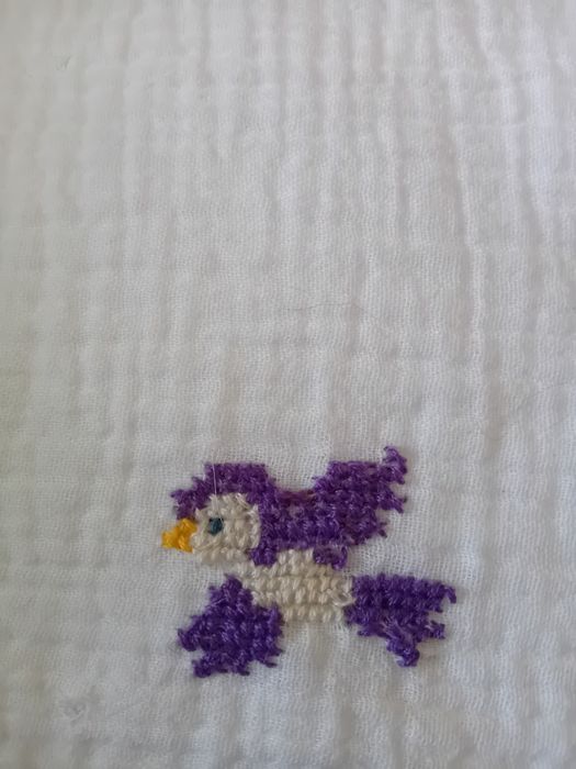 Fraldas bordadas a ponto de cruz