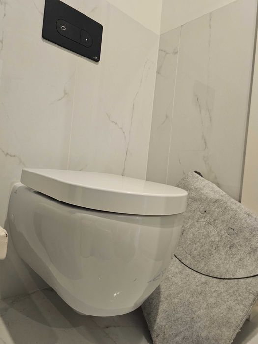 Noken Porcelanosa: Sanita + tampo Arquitect + placa de descarga