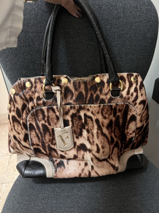 Mala furla pele verdadeira