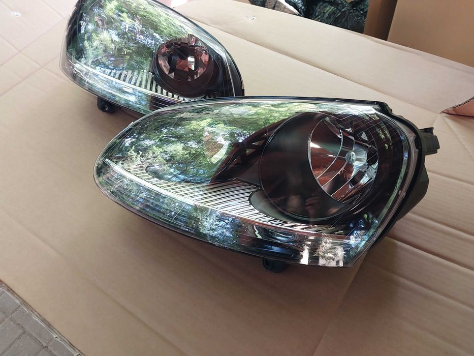 VW GOLF V reflektory lampy nowe CZARNE komplet