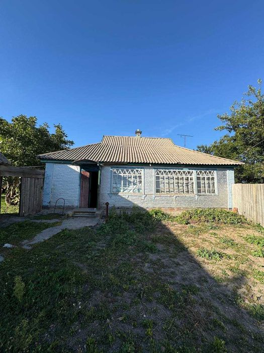 Будинок 58м2, земельна ділянка 50 соток, гараж