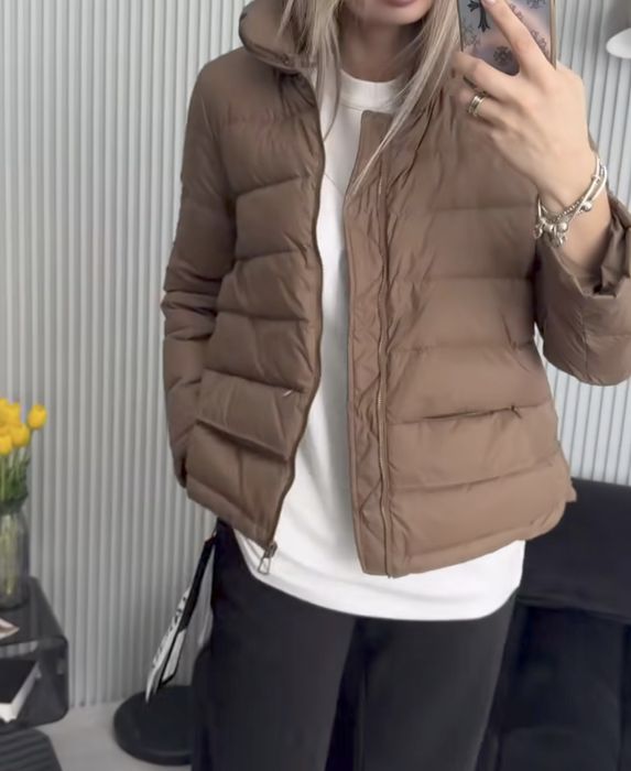 Тоненька весняна куртка (пух)