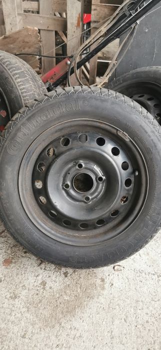 Felgi 15 z oponami do Nissana