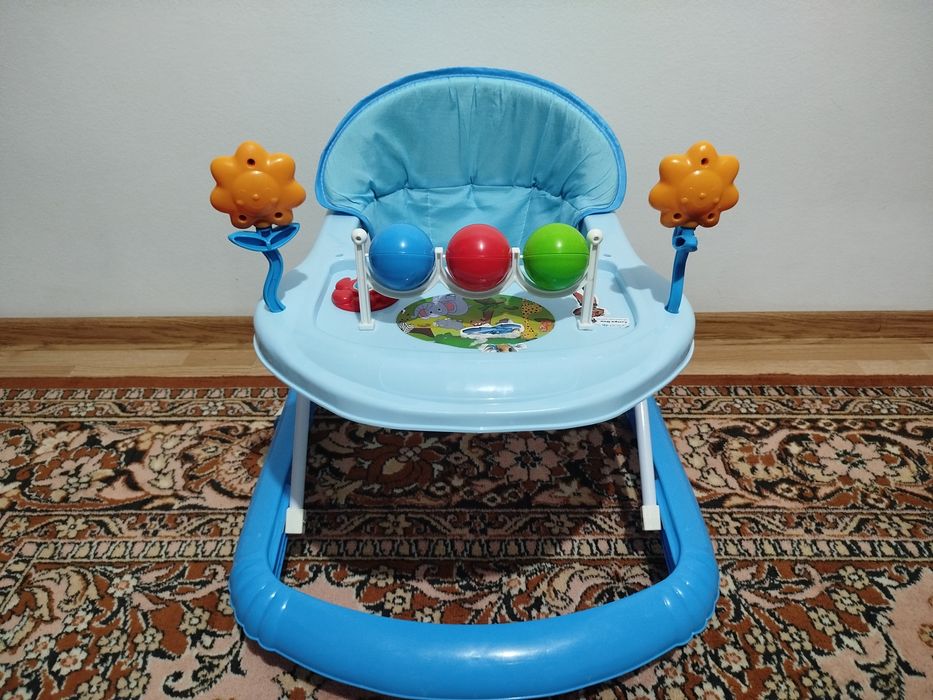 Дитячі ходунки  (ходульки) у відмінному стані блакитні