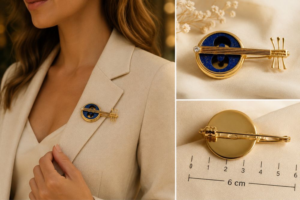Złota broszka 750 brylant lapis lazuli szmaragd