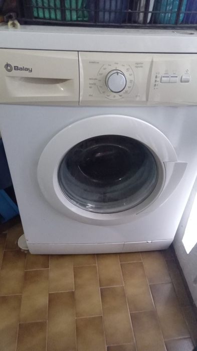 Fogão e macina de roupa