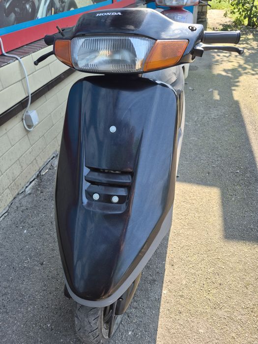 Скутер Honda Tact.